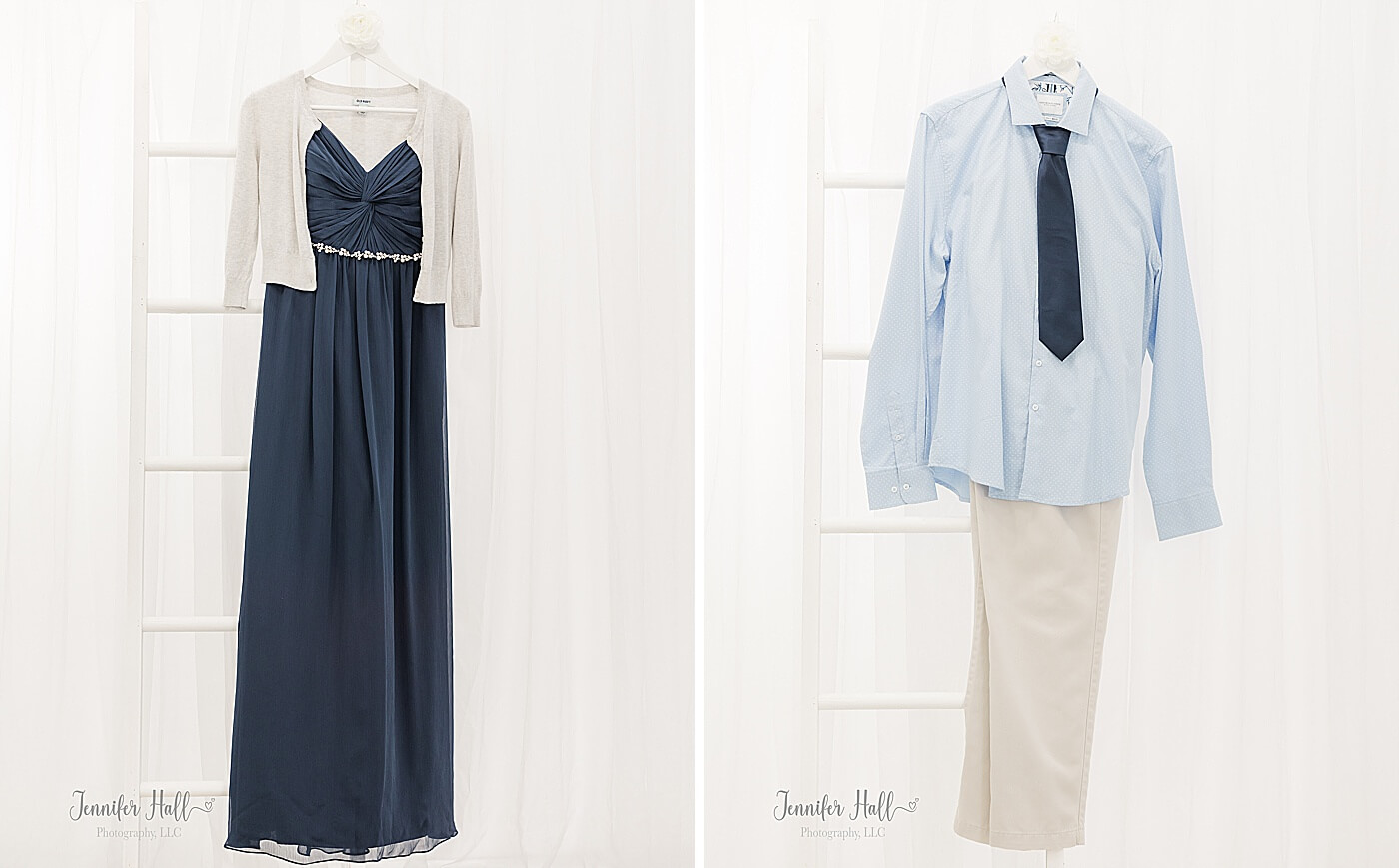 Long, flowy navy dress with a light silver sweater for her and a light sky-blue collared shirt for him hanging up on a ladder in a studio.