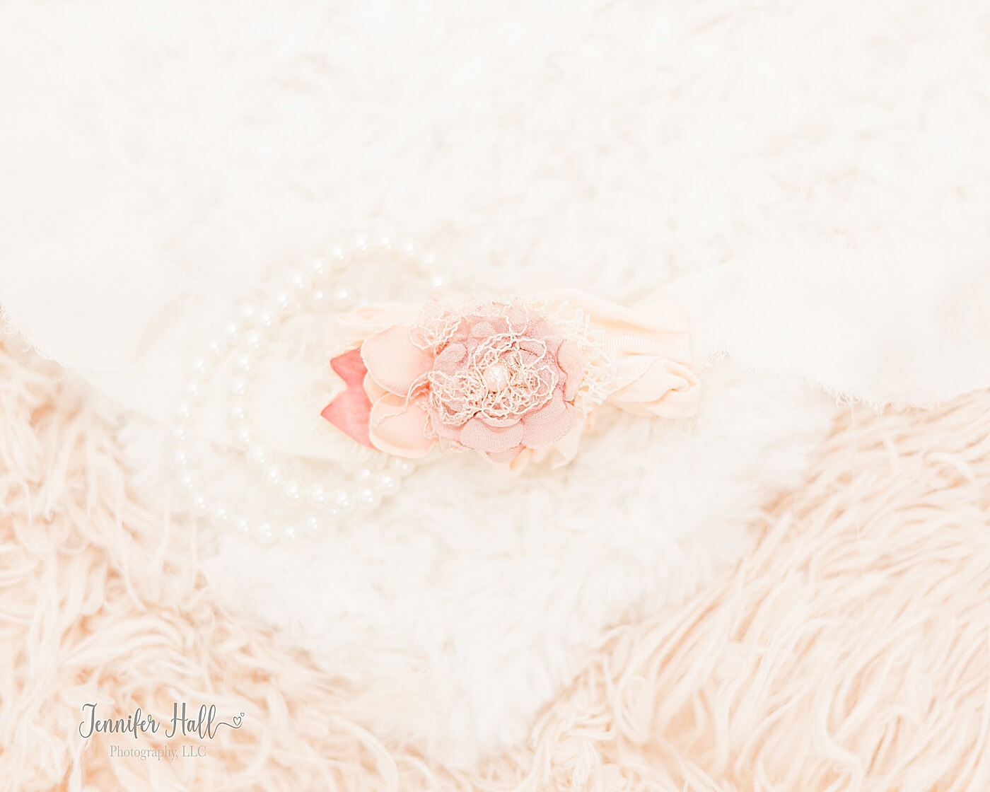 Vanilla blush and blush pink flower headband for little girls laying on blankets for family portrait session outfit ideas for styling girls.