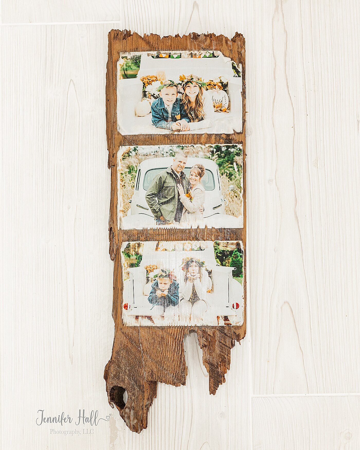 Wooden photo board that has family pictures on it and is shiny for a family photo gift idea for Christmas.