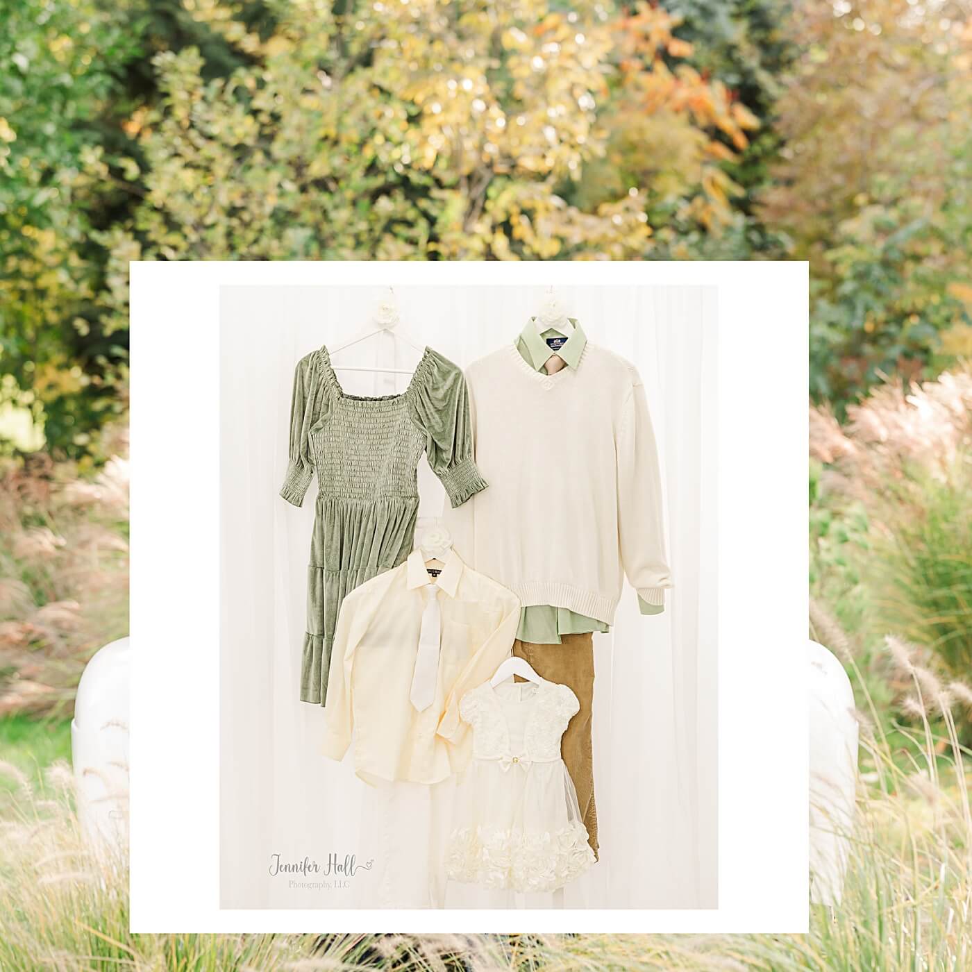 Sage, white, and tan family outfits by fall leaves. 