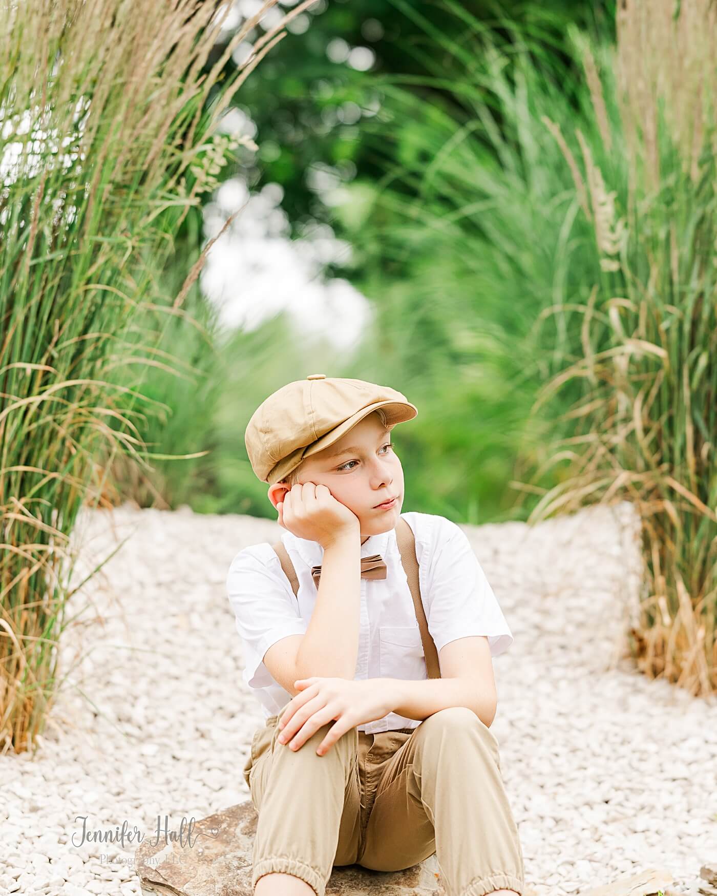 Older boy with a newsboy cap to show what older boys should wear for family pictures.