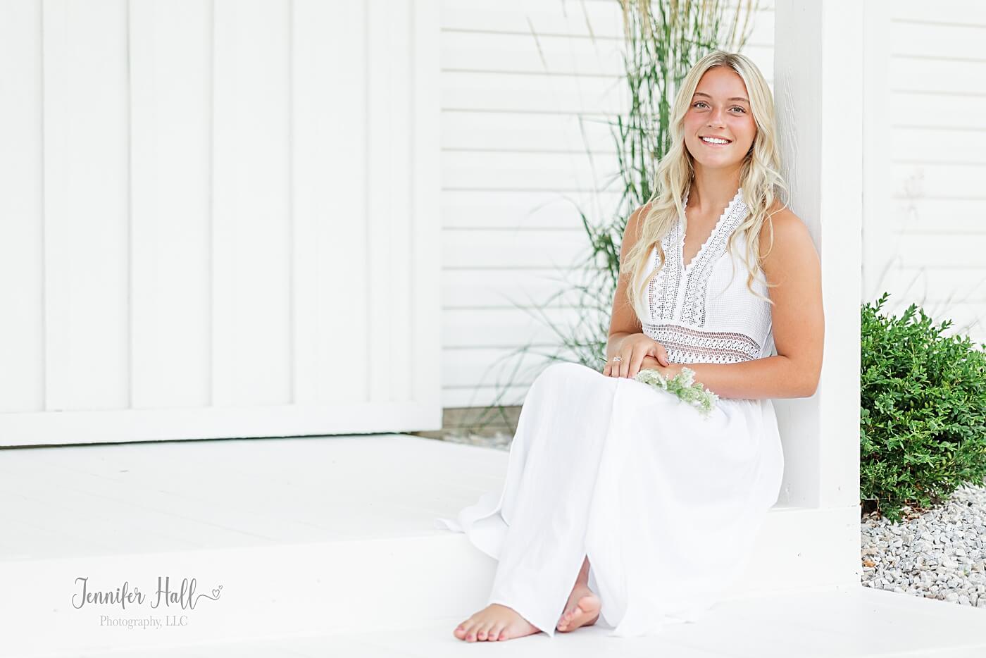 Senior girl with bare feet to show a portrait styling tip for senior girls.