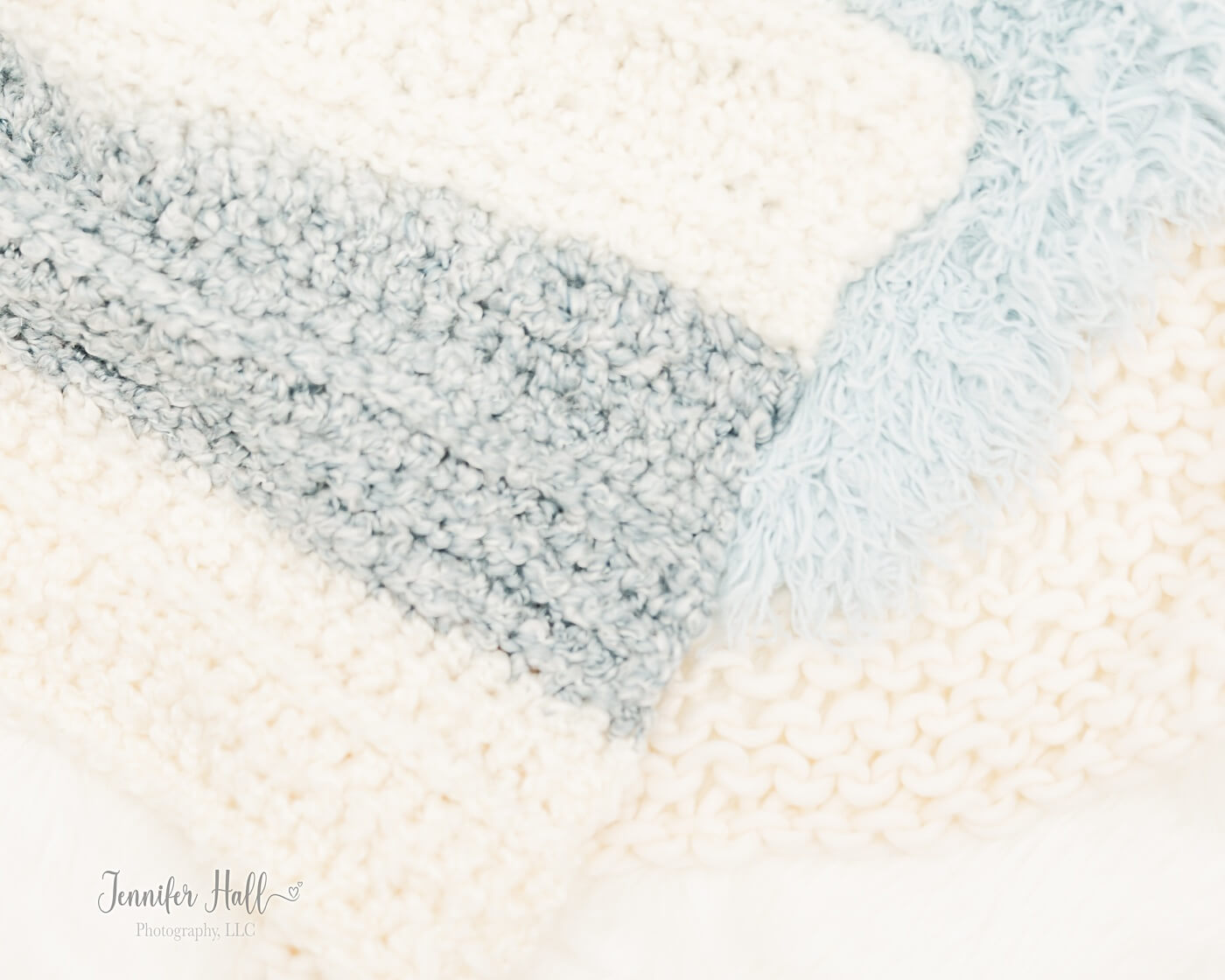 White and blue blankets for a little boy’s accessory to bring for family pictures.