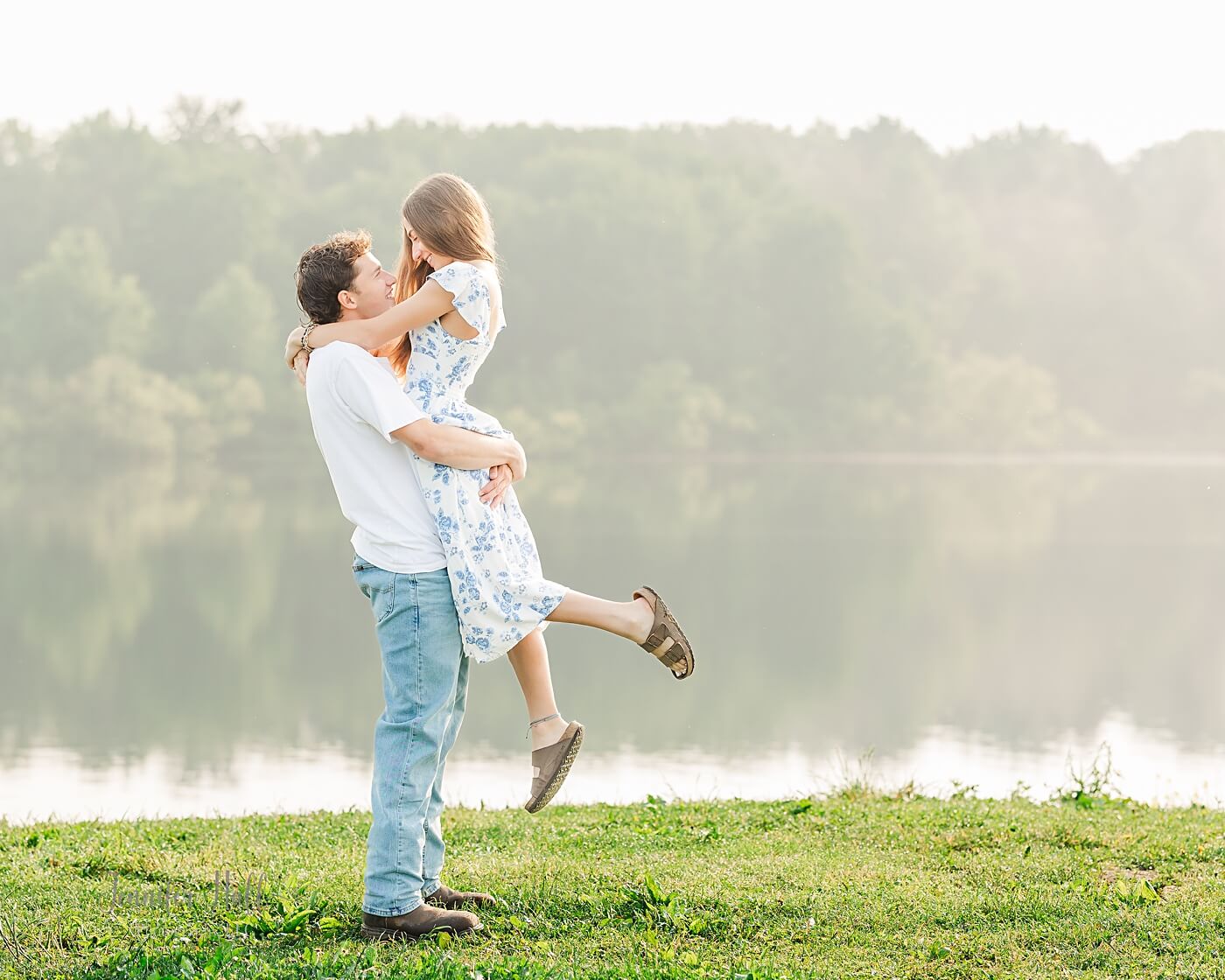 Boy lifting a girl for Howard Eaton Reservoir in North East, PA, couple’s photos.