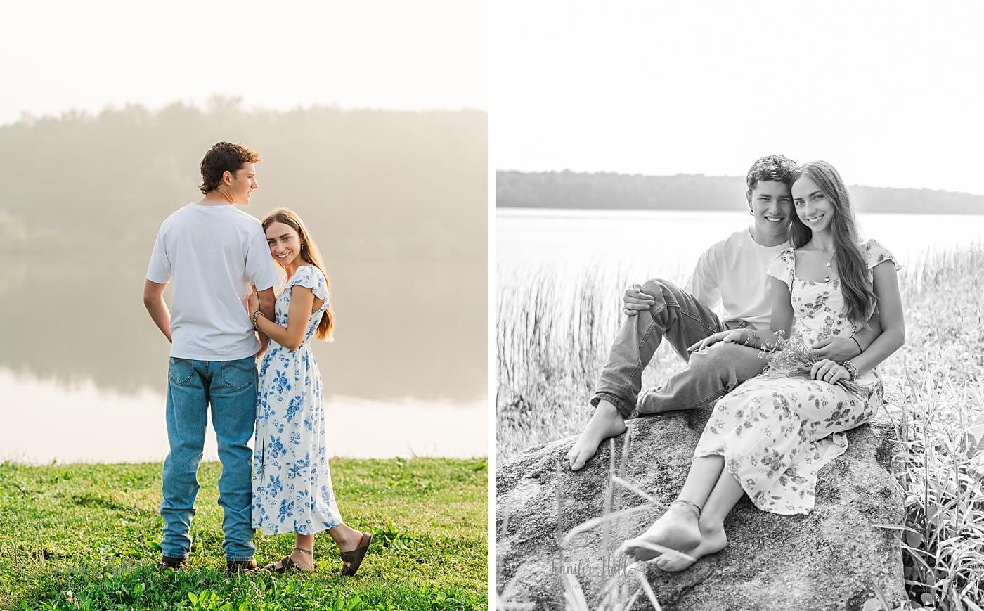 Couple standing together by reservoir water and sitting on large rocks for professional couple’s photos.
